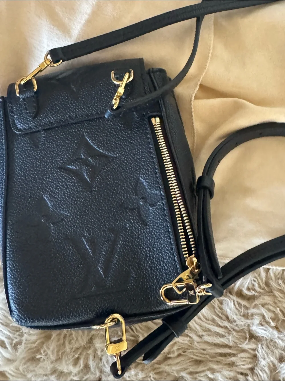 Louis Vuitton Black Leather Mini Backpack with Gold Buckle